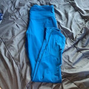 Victorias Sport Size Small Blue Leggings with mesh design on the ankle, shown